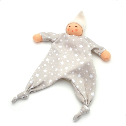 Beige blanket doll with a soft beige knit body covered with white stars and pixie hat in ivory-coloured Terry, hands and hand-painted face in a skin-colored knit, feet represented by knots.