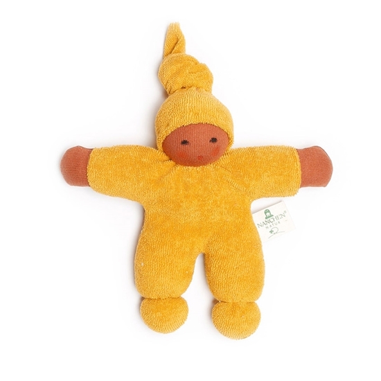Small cuddle doll made of organic cotton and wool, with gold-yellow clothing and light brown skin.