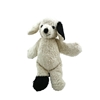 Standing little plush dog with one black ear and one black leg.